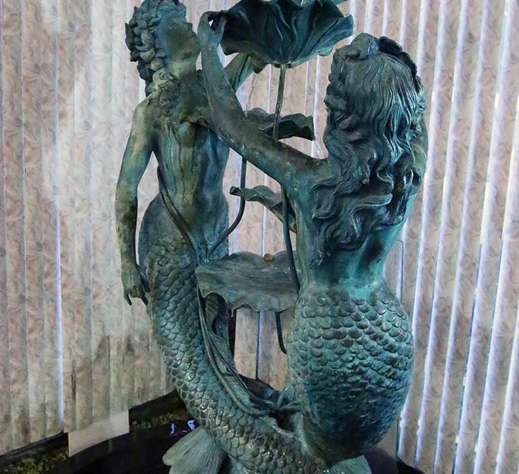 Mermaid Statue at Kew Motor Inn